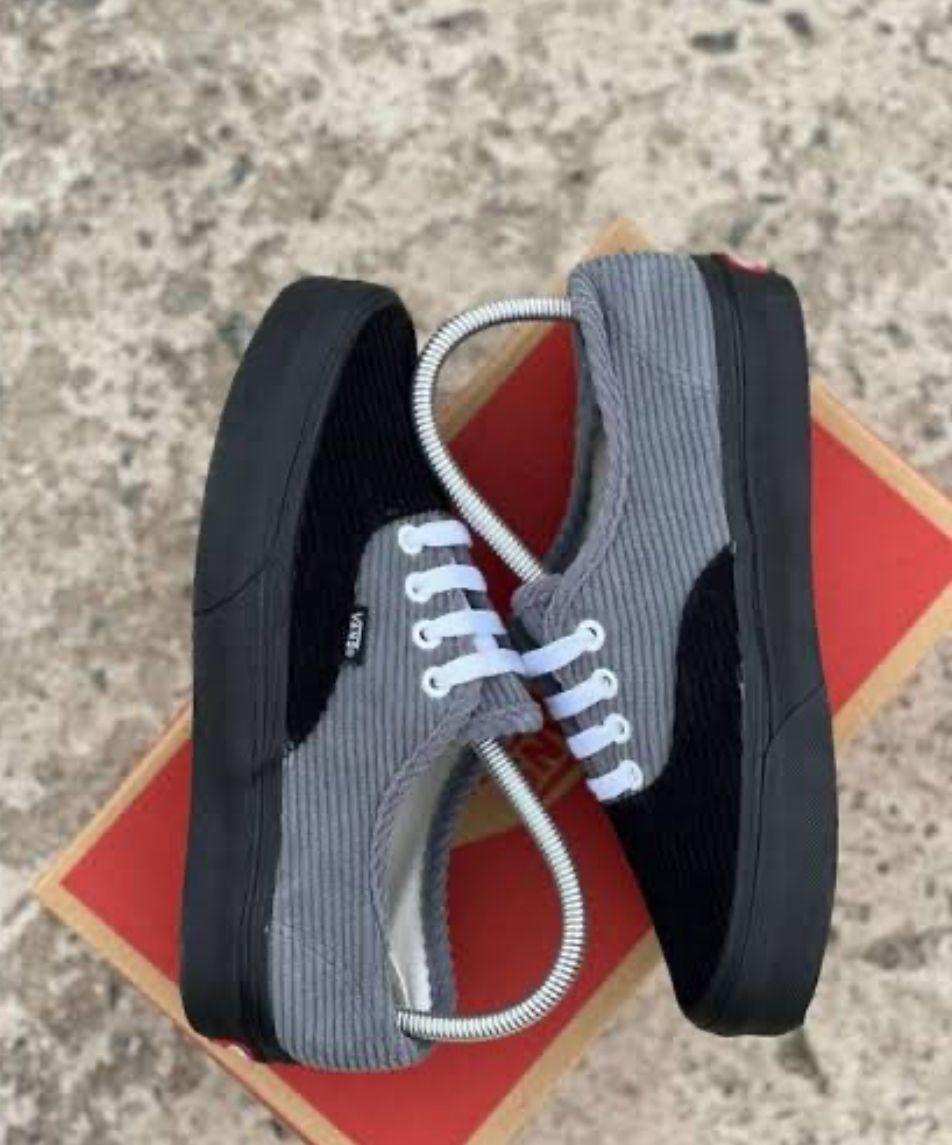 Vans off the walls grey and black